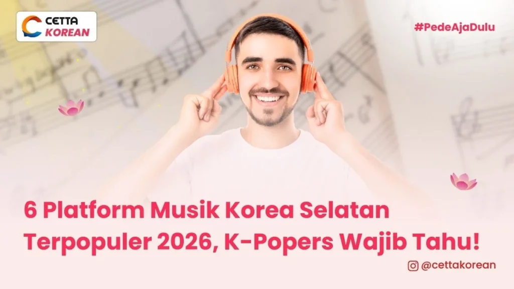 Seorang pria menggunakan headphone orange mendengarkan musik korea melalui salah satu platform musik korea selatan populer 2026