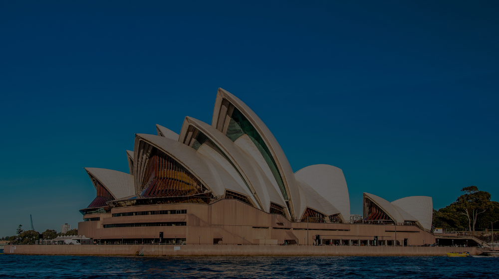 Freepick "Free photo sydney opera house near the beautiful sea under the clear blue sky" by wirestock