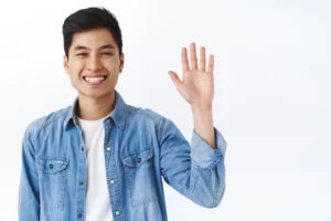 <a href="https://www.freepik.com/free-photo/close-up-portrait-friendly-attractive-asian-man-waving-say-hi-informal-greeting-gesture-laughing-smiling-as-welcoming-new-members-join-team_20765384.htm#query=hi%20japanese&position=0&from_view=search&track=ais">Image by cookie_studio</a> on Freepik