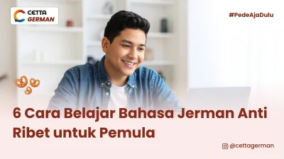 Seorang pria sedang belajar bahasa Jerman di website untuk pemula