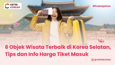 seorang traveller berpose di depan salah satu destinasi populer di korea selatan