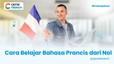 Seorang lelaki sedang mengibarkan bendera Prancis
