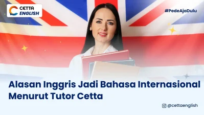 seorang guru bahasa inggris berpose di depan bendera England menejelaskan alasan bahasa inggris menjadi bahasa internasional ala tutor cetta