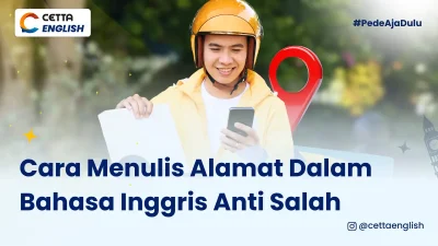 seorang kuris sedang melihat gawainya tampak seperti sedang mencari alamat