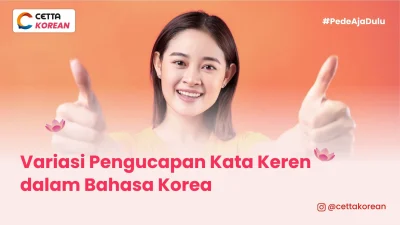 seorang wanita muda kasih jempol dua sambil tersenyum